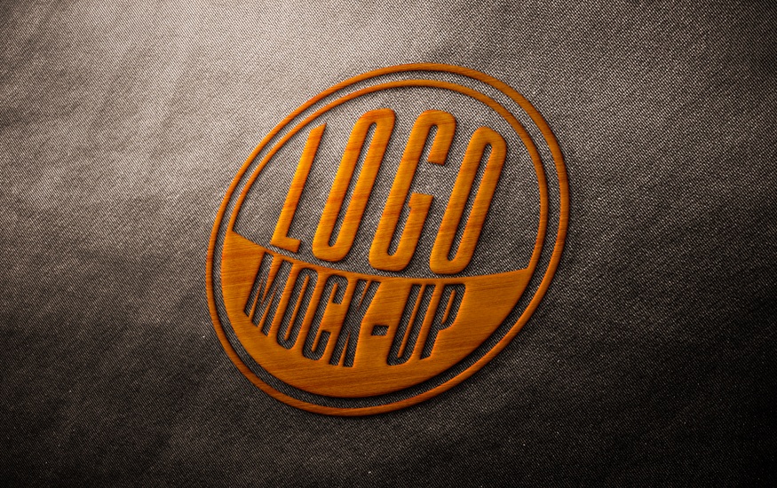 凸出的刺绣logo样机素材，棕色的布纹背景ps样机场景
