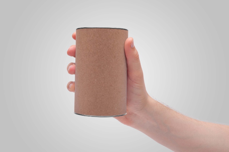 手持咖啡茶叶罐素材